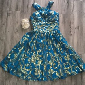 Cache gold accented criss cross dress